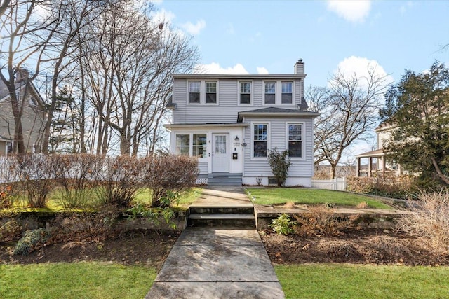 view of front facade featuring a front yard