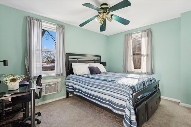 carpeted bedroom featuring an AC wall unit and ceiling fan