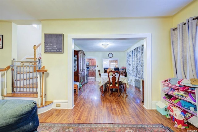 dining room featuring wood-type flooring