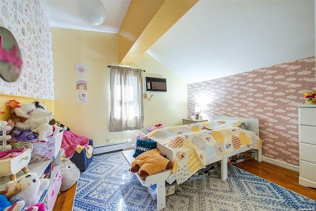 bedroom with baseboard heating, an AC wall unit, vaulted ceiling, and hardwood / wood-style floors