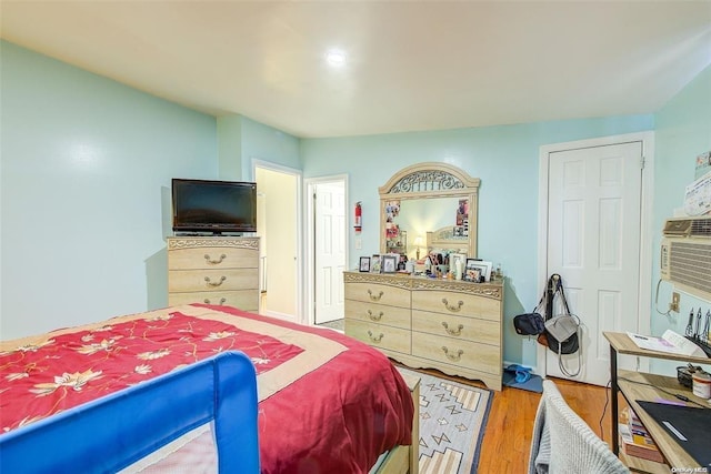 bedroom with light wood-type flooring