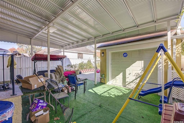 view of patio featuring a playground