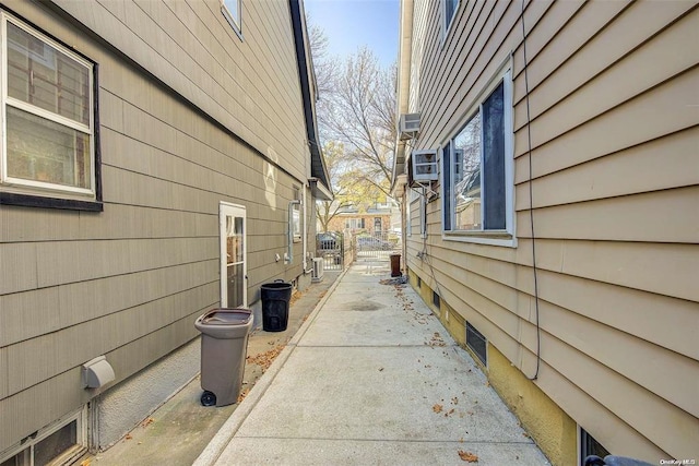 view of side of property featuring central air condition unit