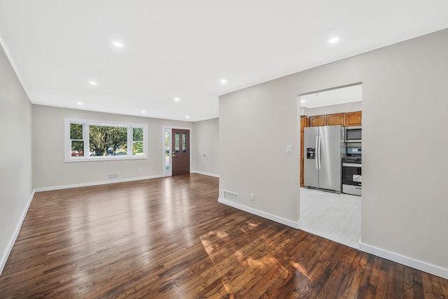 unfurnished living room featuring light hardwood / wood-style flooring