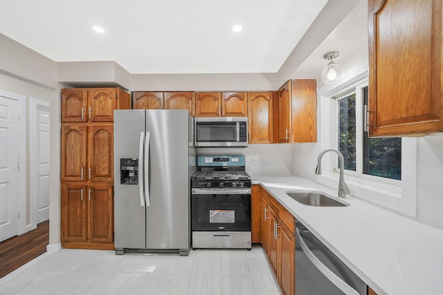 kitchen featuring sink, stainless steel appliances, and tasteful backsplash