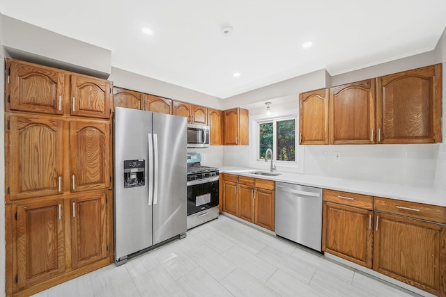 kitchen featuring stainless steel appliances and sink