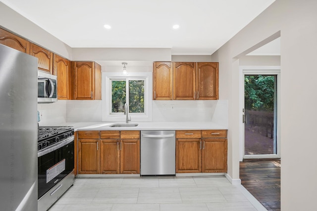 kitchen featuring stainless steel appliances and sink