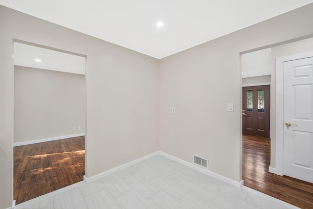 unfurnished room featuring light wood-type flooring