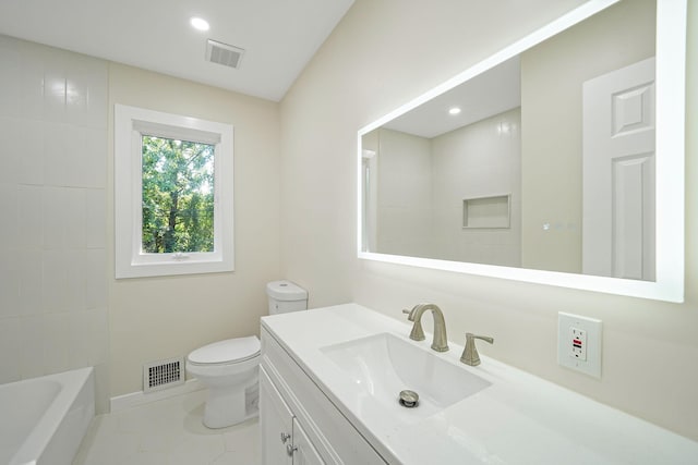 bathroom with toilet and vanity