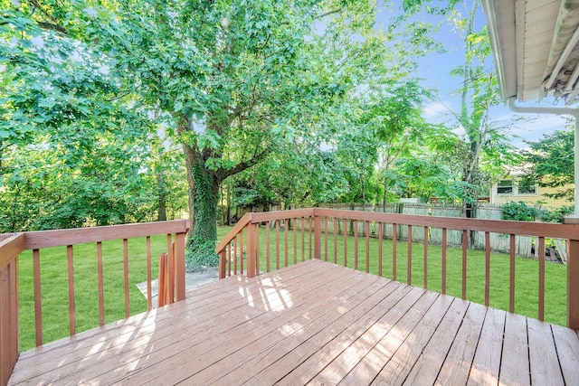 deck featuring a lawn