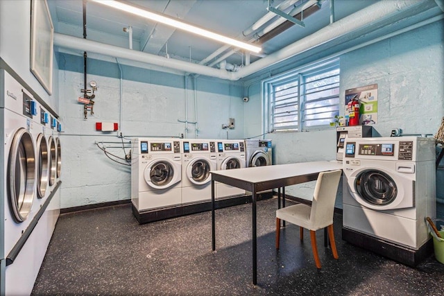 laundry room with stacked washer / dryer and independent washer and dryer