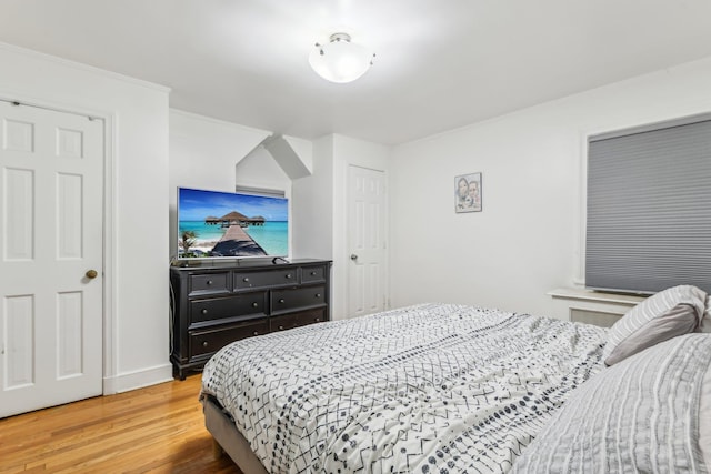 bedroom featuring hardwood / wood-style floors