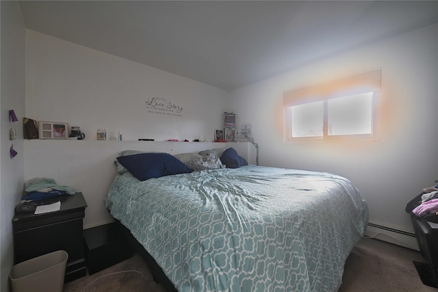 bedroom featuring carpet and a baseboard radiator