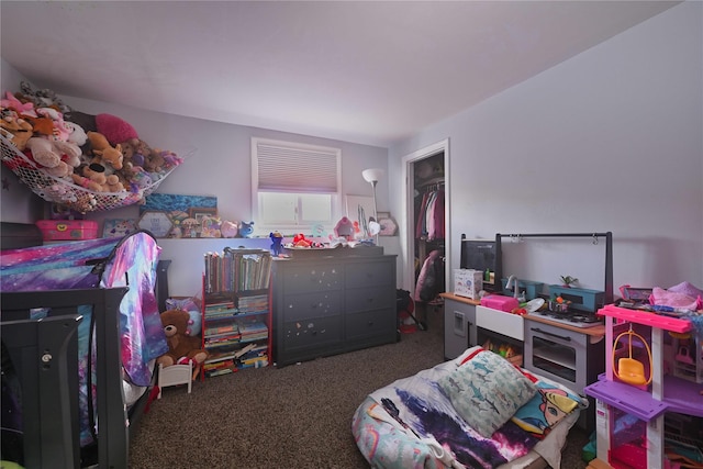 carpeted bedroom featuring a closet