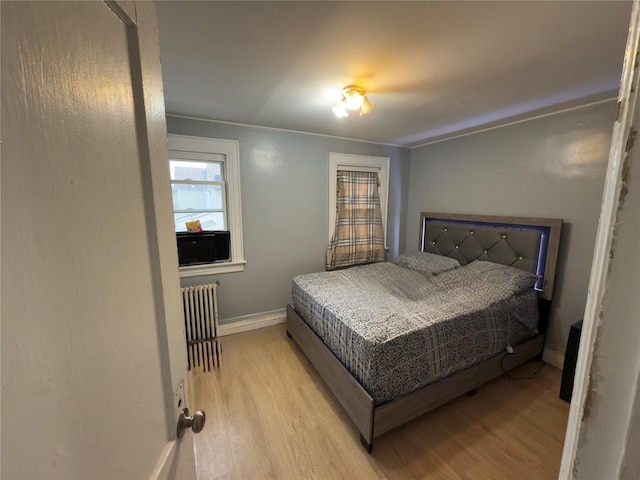 bedroom with light wood-type flooring