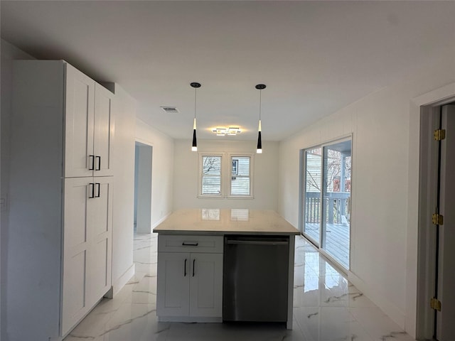 kitchen featuring hanging light fixtures, white cabinets, dishwasher, and a center island