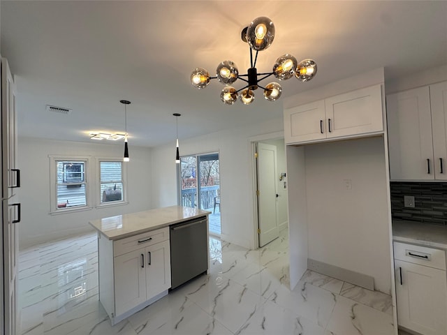 kitchen featuring pendant lighting, white cabinets, dishwasher, backsplash, and a notable chandelier