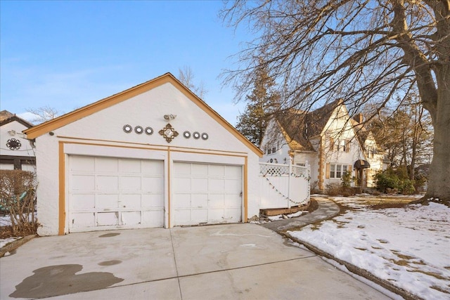 view of snow covered garage