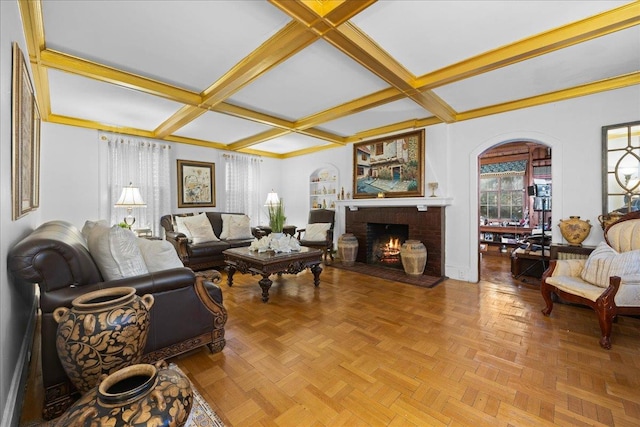 living room featuring light parquet floors, coffered ceiling, a fireplace, and beamed ceiling