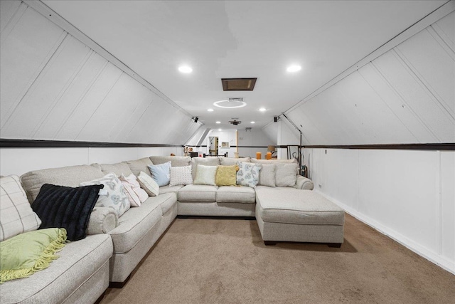 living room featuring vaulted ceiling and light colored carpet