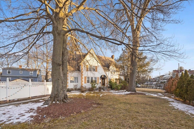 view of front of home with a lawn