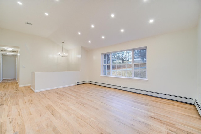 unfurnished room with lofted ceiling, a baseboard heating unit, a notable chandelier, and light hardwood / wood-style floors