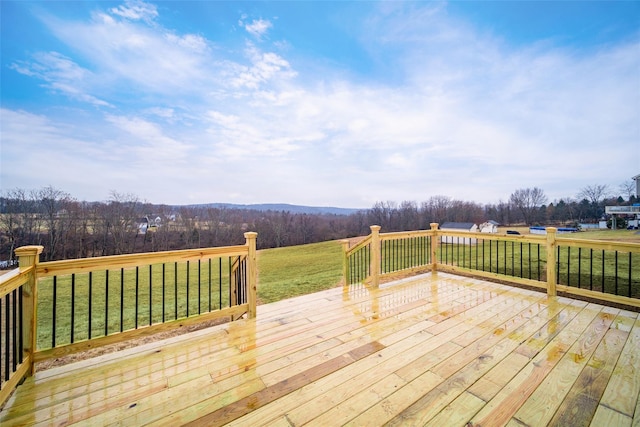 deck featuring a yard