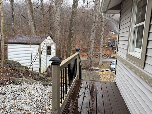 wooden deck with a storage unit