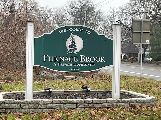 view of community sign