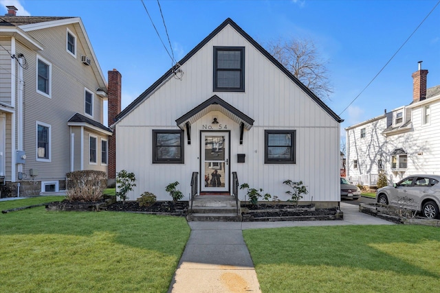 view of front of home with a front lawn