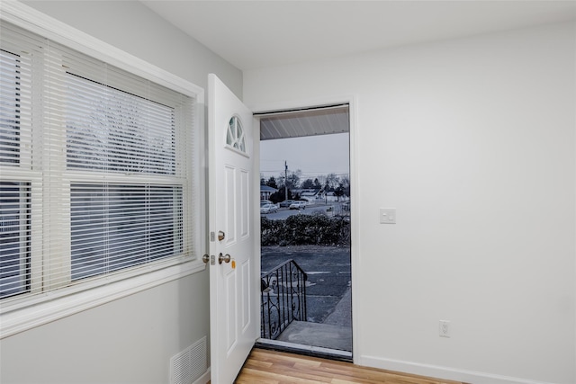 interior space with hardwood / wood-style floors