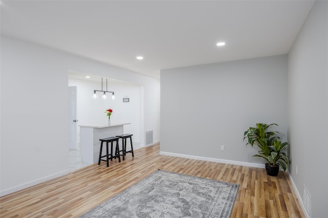 living area featuring light hardwood / wood-style floors