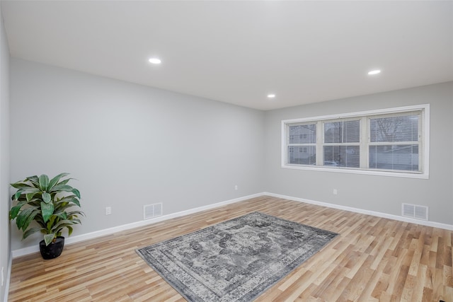 empty room with light wood-type flooring