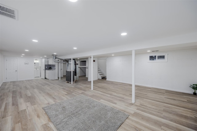 basement with light wood-type flooring