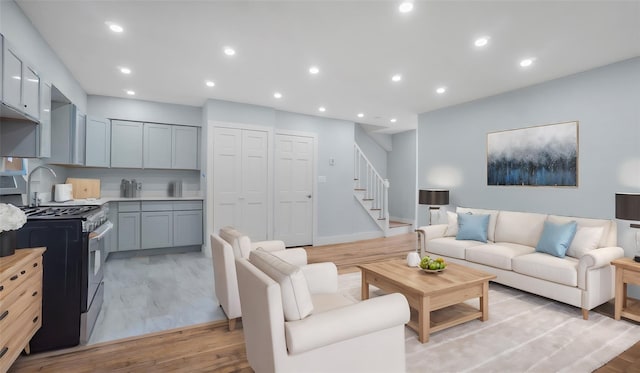 living room with light hardwood / wood-style floors