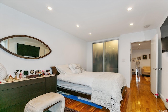 bedroom featuring hardwood / wood-style floors