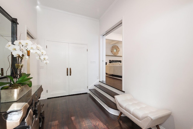 652 Long Hill Rd W, Briarcliff Manor, NY 10510 - foyer featuring crown molding and dark wood-type flooring