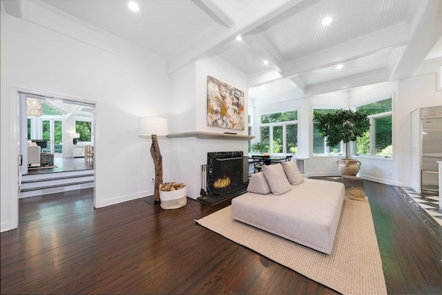 652 Long Hill Rd W, Briarcliff Manor, NY 10510 - living area with hardwood / wood-style flooring, beamed ceiling, a lit fireplace, baseboards, and recessed lighting