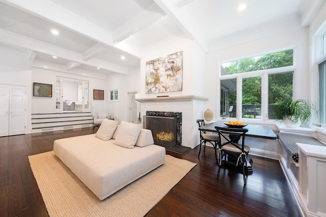 652 Long Hill Rd W, Briarcliff Manor, NY 10510 - living area with beamed ceiling, hardwood / wood-style flooring, a premium fireplace, recessed lighting, and stairway