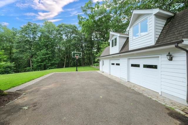 652 Long Hill Rd W, Briarcliff Manor, NY 10510 - view of property exterior featuring asphalt driveway, a yard, and roof with shingles