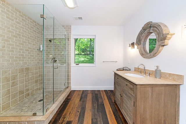 652 Long Hill Rd W, Briarcliff Manor, NY 10510 - full bath with wood-type flooring, a shower stall, baseboards, and vanity