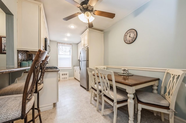 dining room with ceiling fan