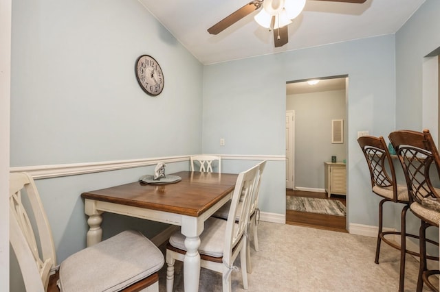 dining room featuring ceiling fan