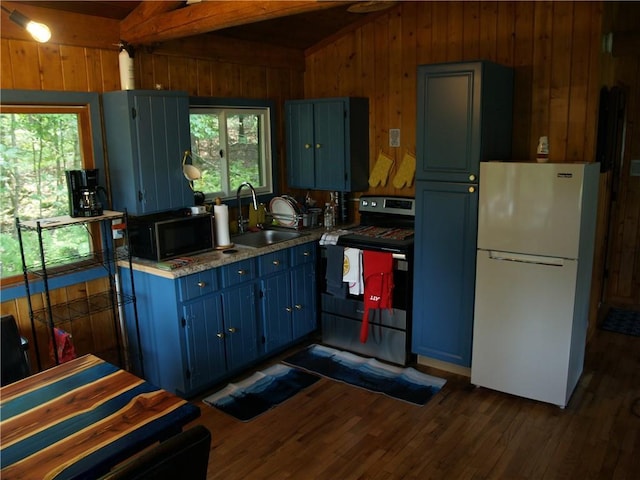 kitchen featuring stainless steel range with electric cooktop, dark hardwood / wood-style flooring, white refrigerator, sink, and blue cabinetry