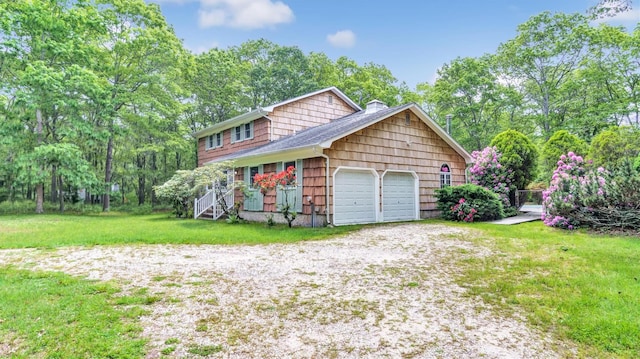 47A Old Squires Rd, Hampton Bays, NY 11946 - view of front facade featuring a chimney, a front lawn, view of wooded area, and a garage