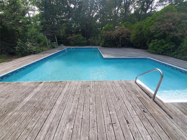 47A Old Squires Rd, Hampton Bays, NY 11946 - swimming pool with a wooden deck
