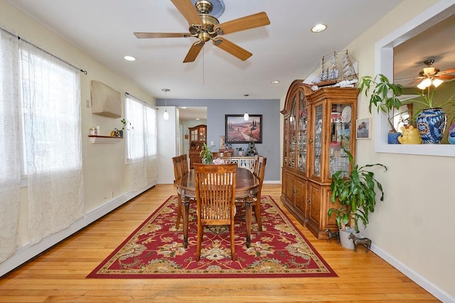 dining space featuring light hardwood / wood-style flooring