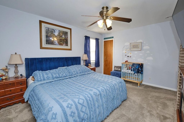 bedroom featuring ceiling fan and carpet floors