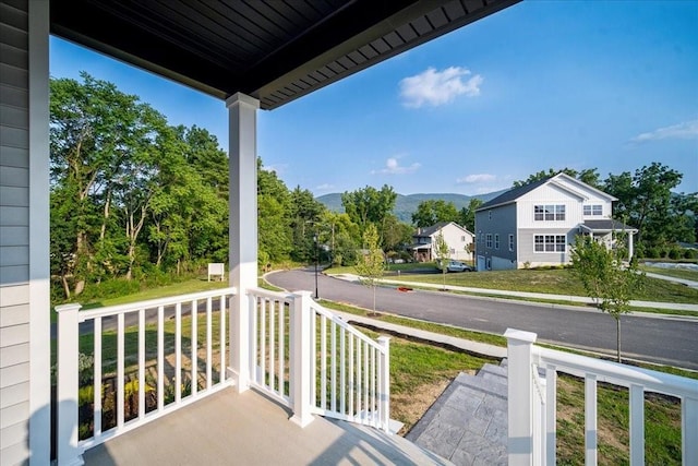 balcony featuring a porch