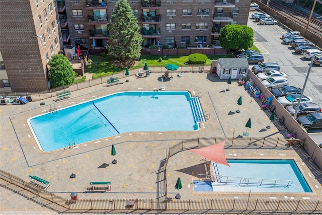 view of swimming pool featuring a patio